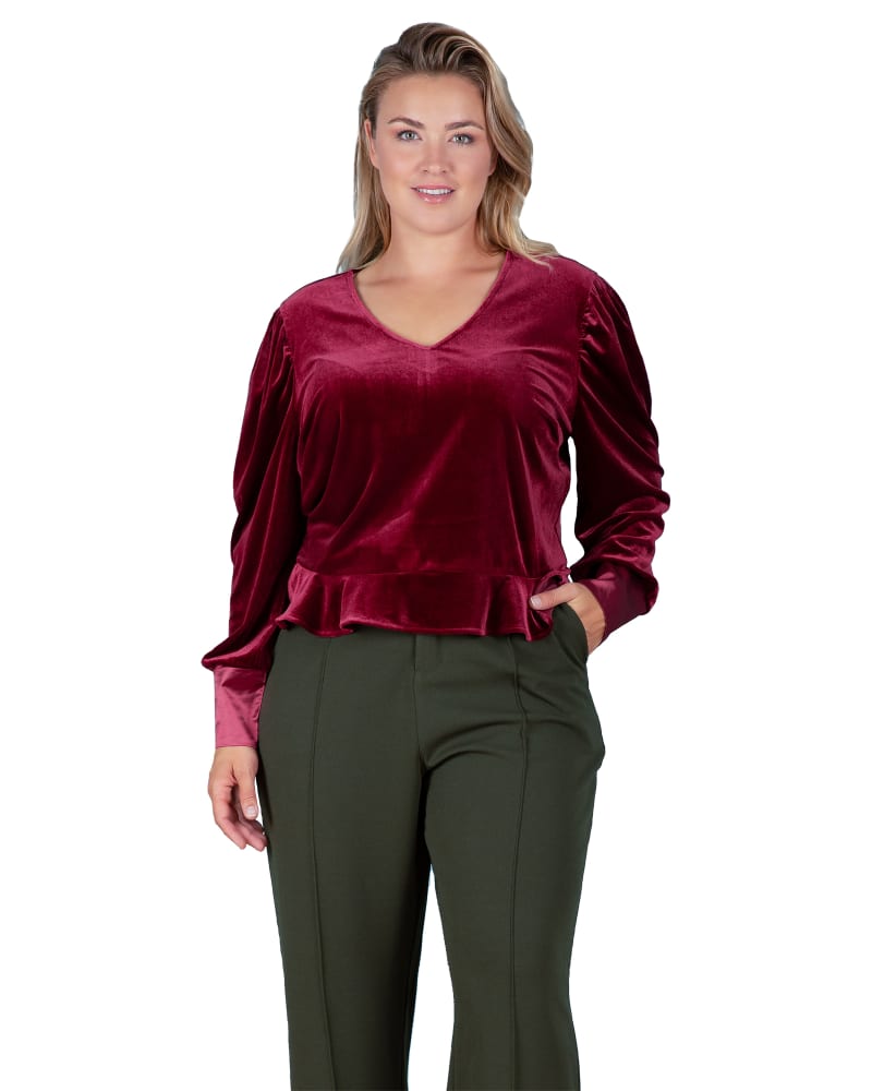 Front of a model wearing a size L Stretch Velvet Peplum Top in Deepred by Standards & Practices. | dia_product_style_image_id:280592